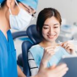 dental assistant helping a patient at the dental office, dental assistants help the dental office run smoother